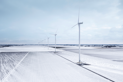 Wind turbines in a snowstorm